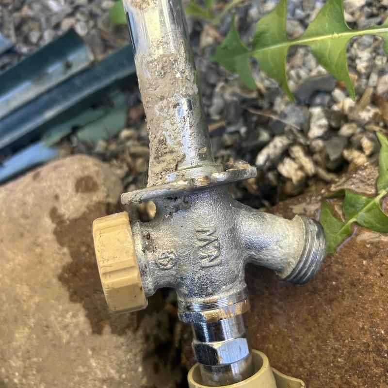 Hose bib spigot with replacement fittings outdoors Hose bib spigot with replacement fittings outdoors