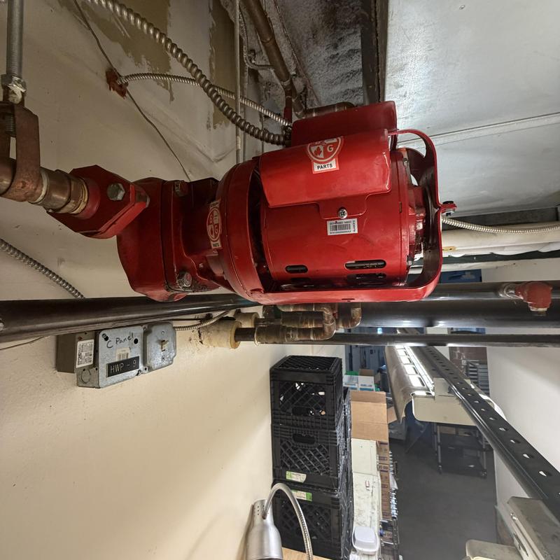 Trash area pump with motor and piping system