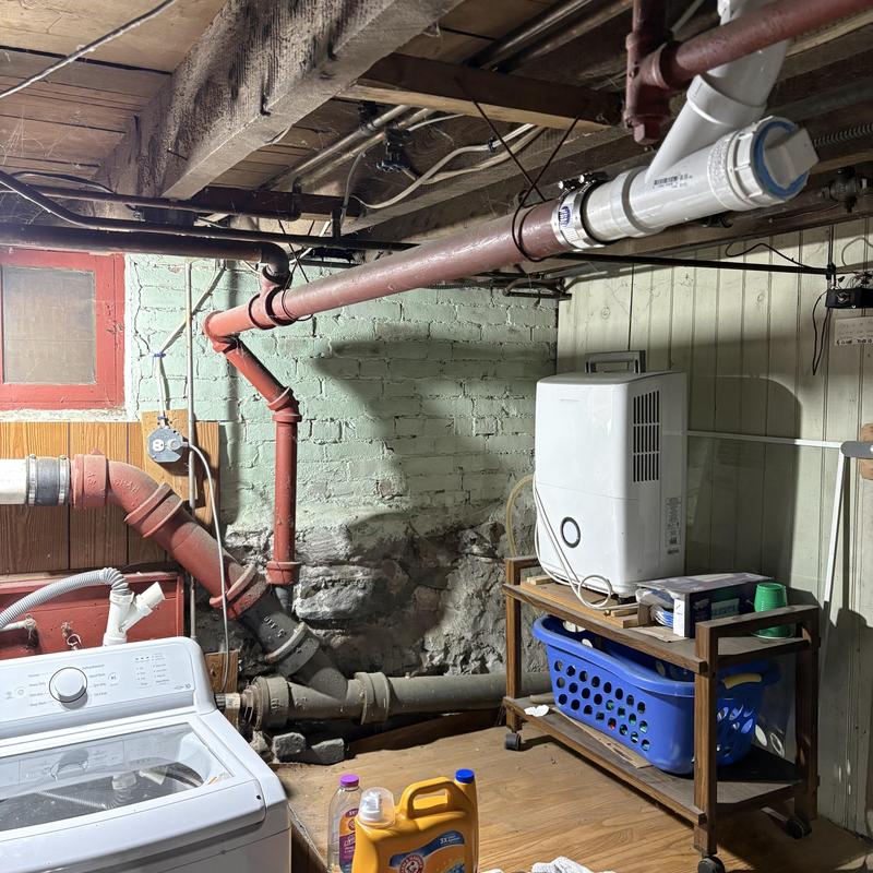 Galvanized kitchen stack piping with drainage setup