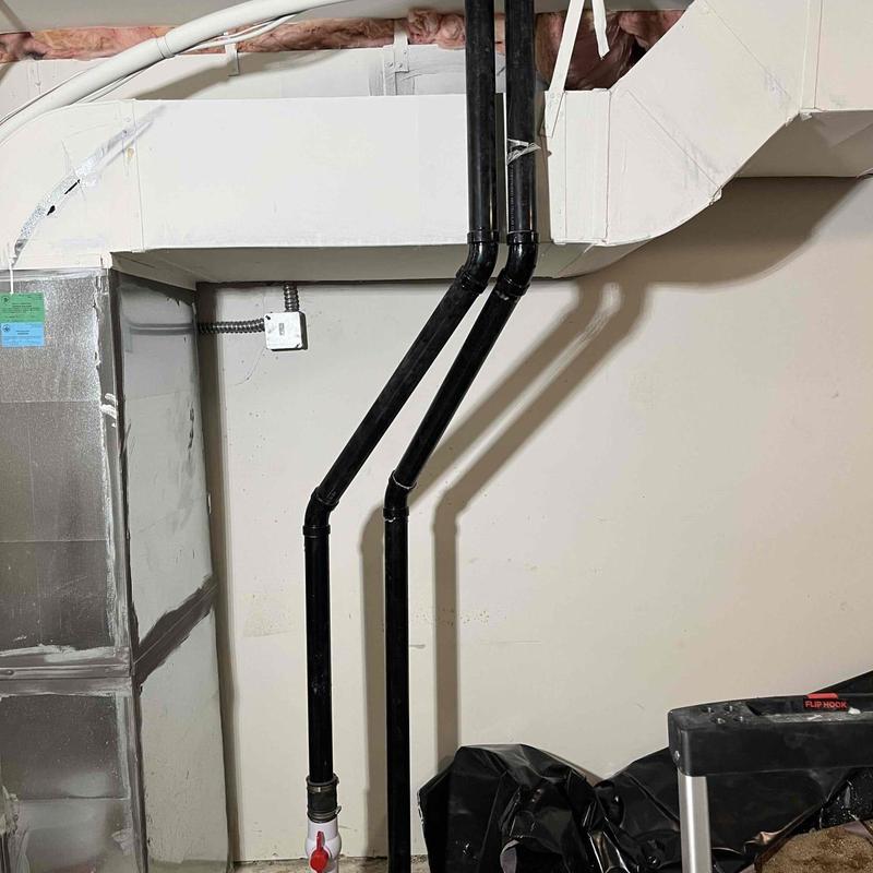 Sewage ejection pump piping and vent lines in basement Sewage ejection pump piping and vent lines in basement