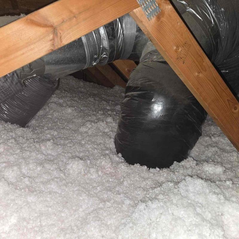 Ductwork with insulation in attic space Ductwork with insulation in attic space