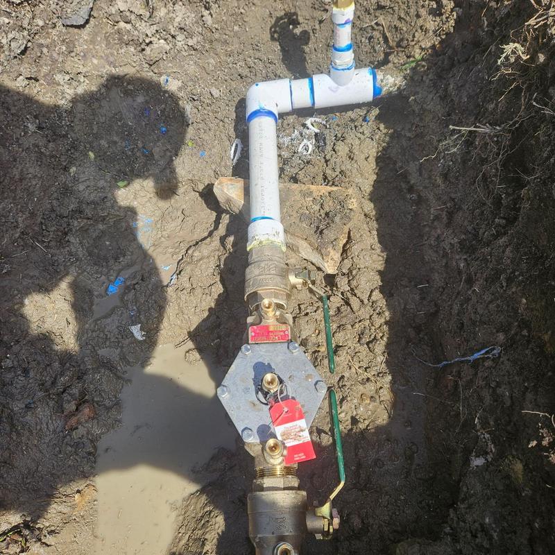 Double check valve assembly with PVC piping in soil