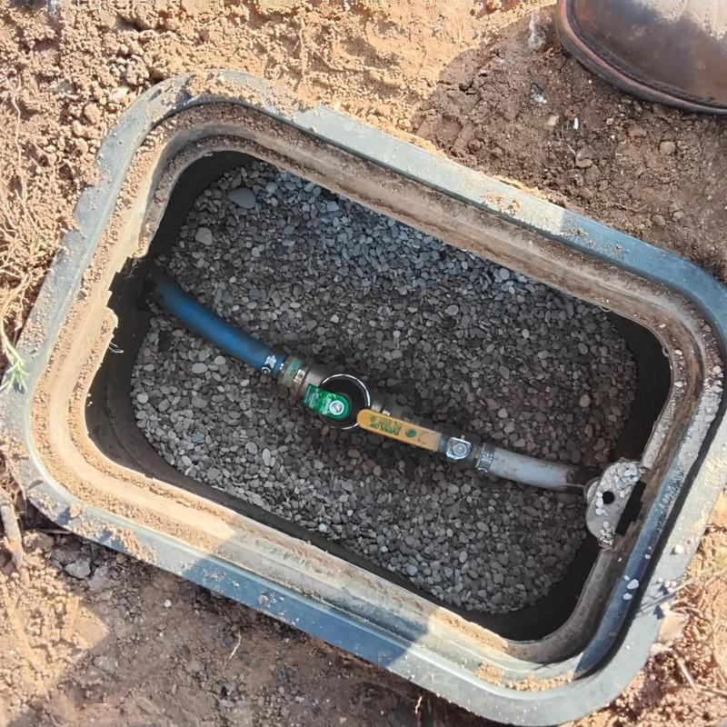 Outdoor water meter box with shutoff valve installation