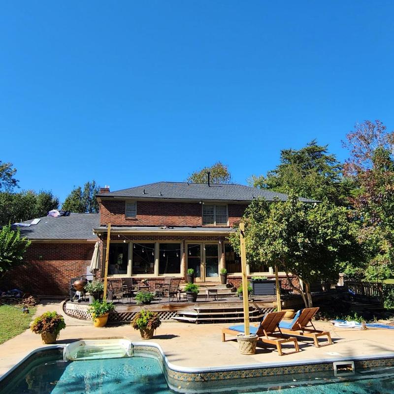 Owens Corning Onyx Black shingle roof on brick house