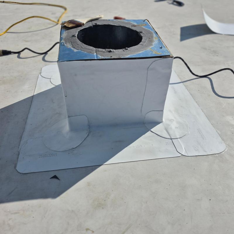 TPO pipe penetration flashing with sealed rooftop curb
