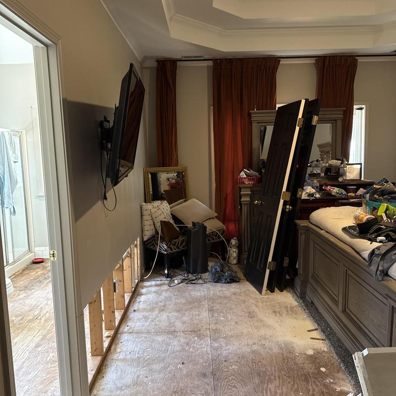 Drywall and flooring removal in master bedroom after leak