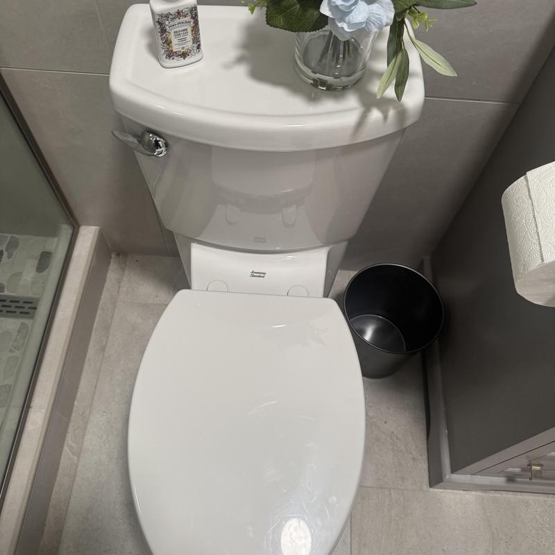 Toilet base realignment and stabilization in bathroom