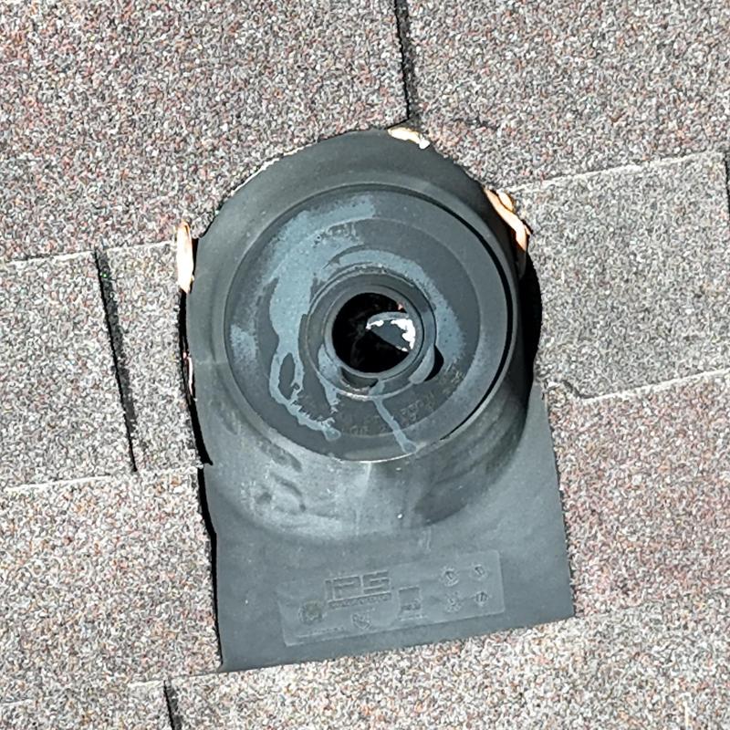 Pipe boot on roof with missing shingles nearby