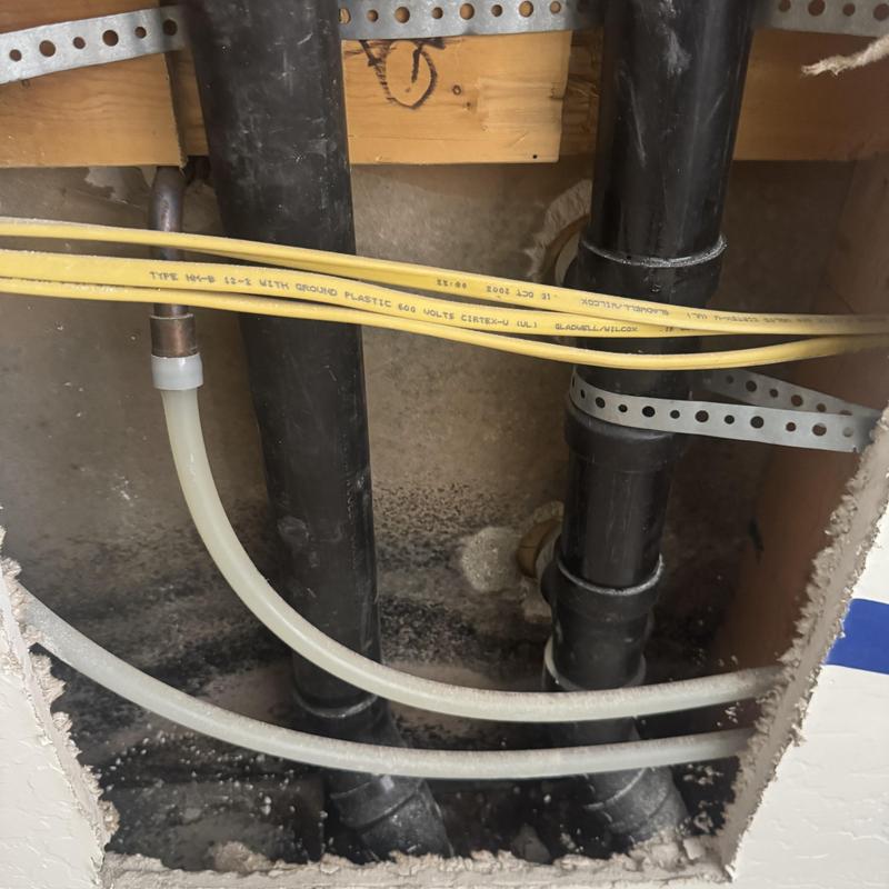 Sewer pipe behind wall near sink in Buckeye, AZ