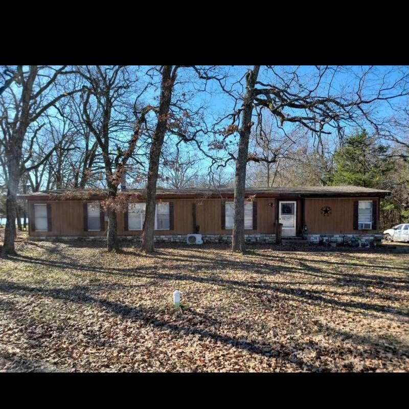Wood shingle roof with hail damage on residential home