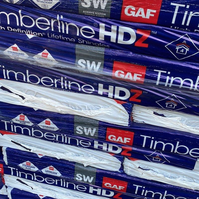 GAF Timberline HDZ roofing shingles stacked. GAF Timberline HDZ roofing shingles stacked.