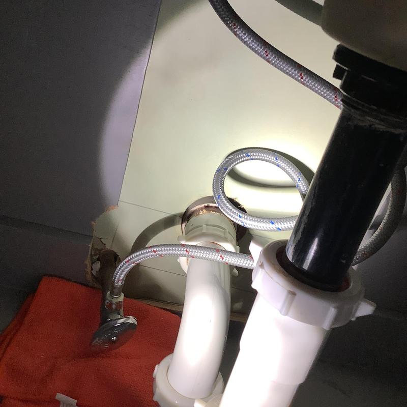 Shut off valve and supply lines under lavatory sink