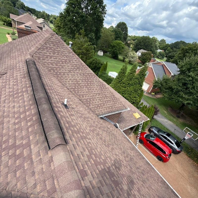 Asphalt shingle roof inspection with hail damage