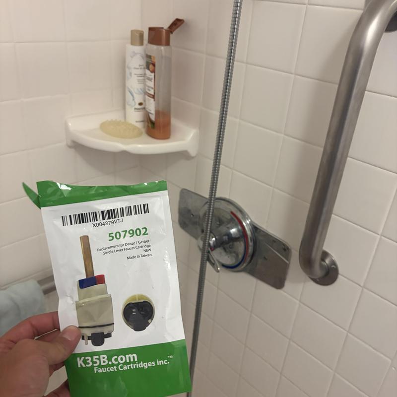 Single lever faucet cartridge with shower valve panel