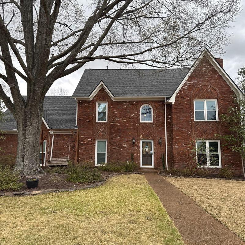 Asphalt shingle roof replacement on brick home