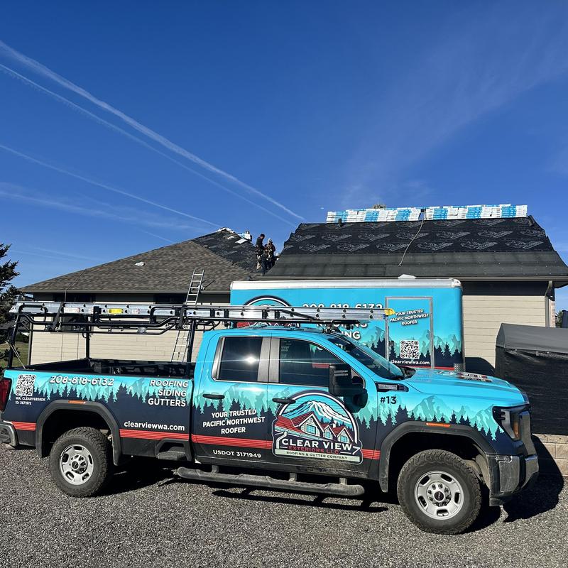 Residential asphalt shingle roof replacement in progress