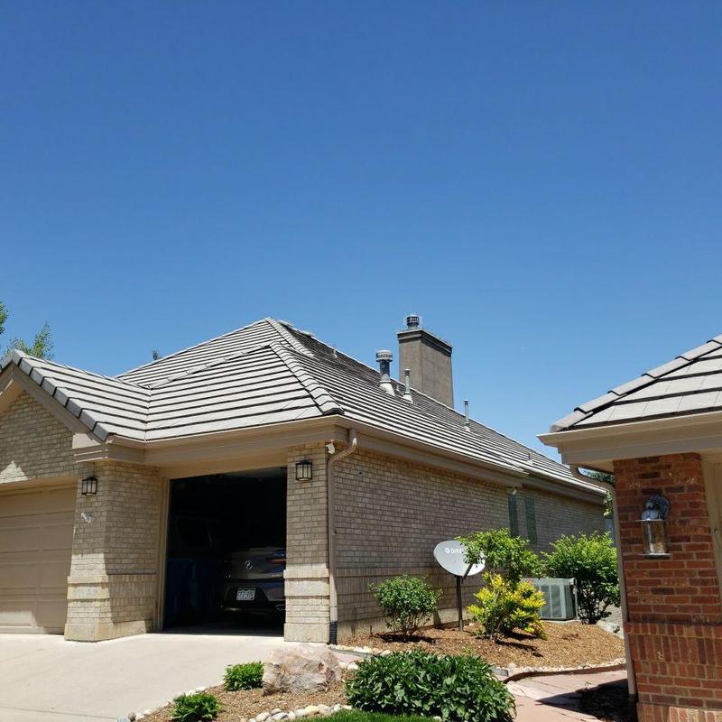 Tile roof with multiple pipe jacks and chimney flashing