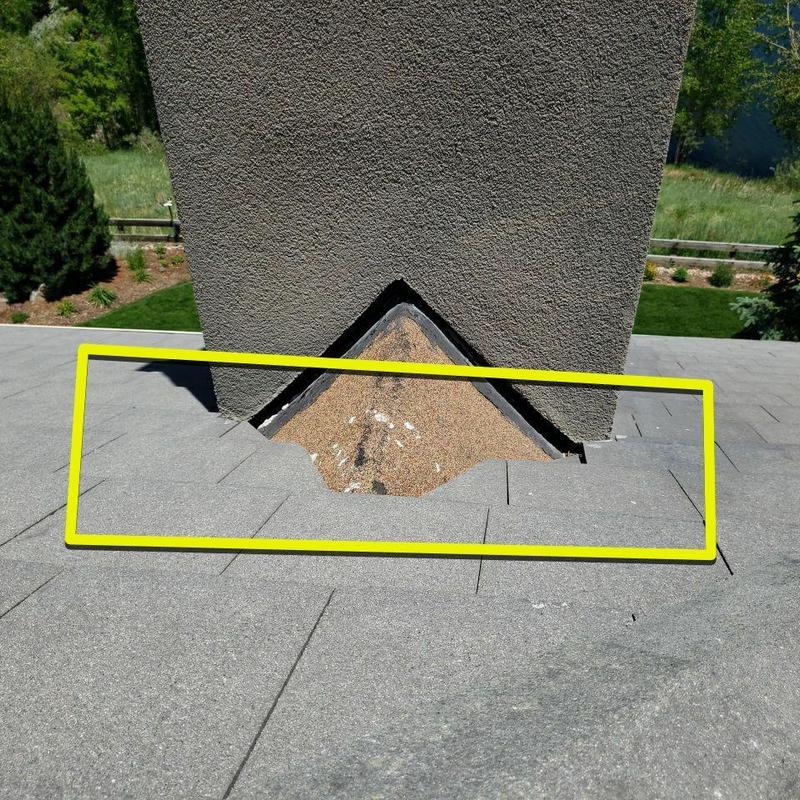 Chimney flashing with damaged roof shingles