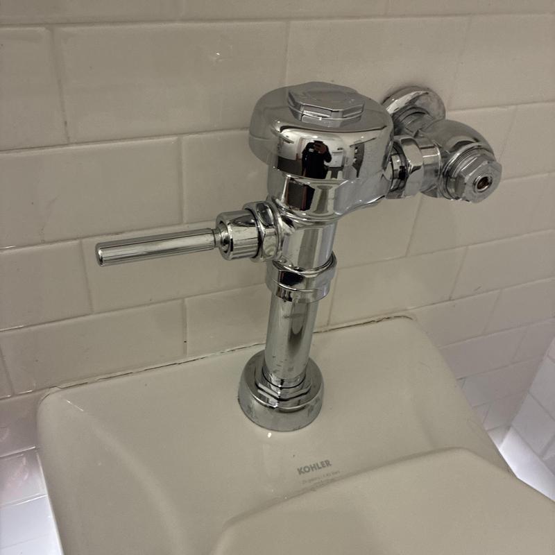 Flushometer valve replacement on commercial toilet
