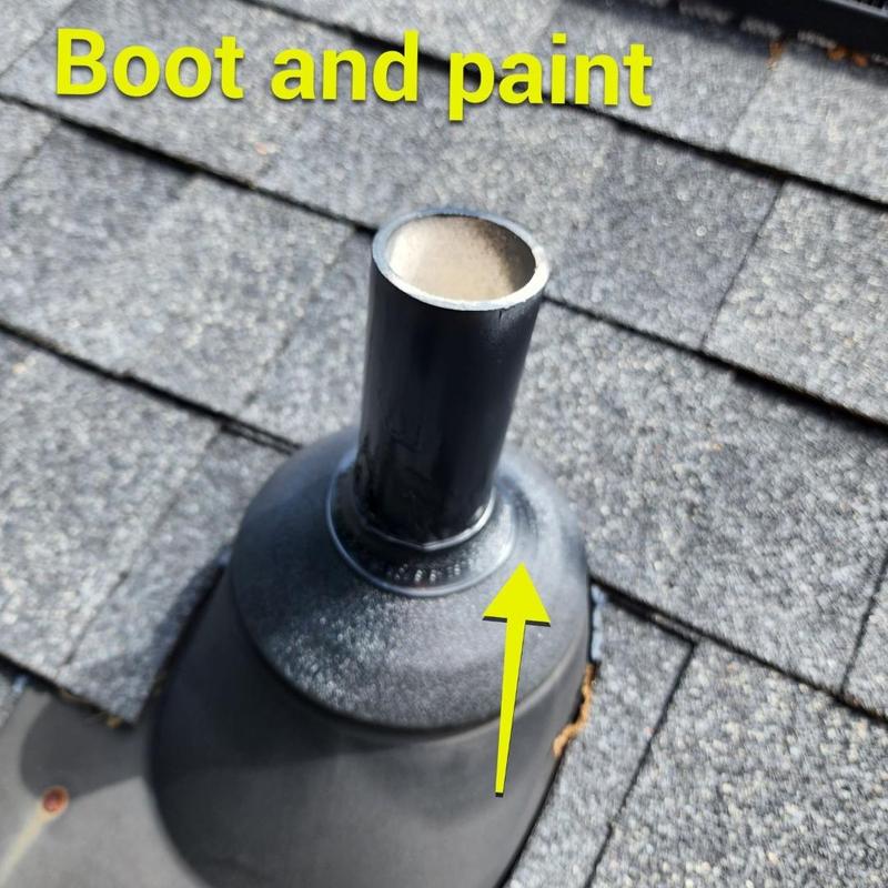 Pipe boot with fresh black paint on roof shingles