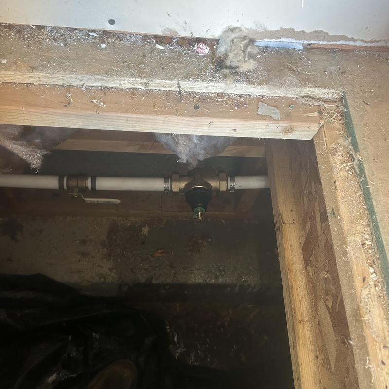Pressure reducing valve installed on water line under floor Pressure reducing valve installed on water line under floor