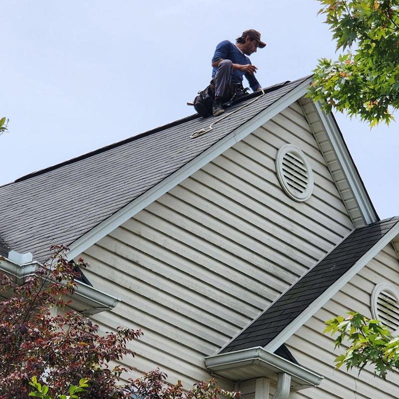 Pipe boots and shingle installation on steep roof