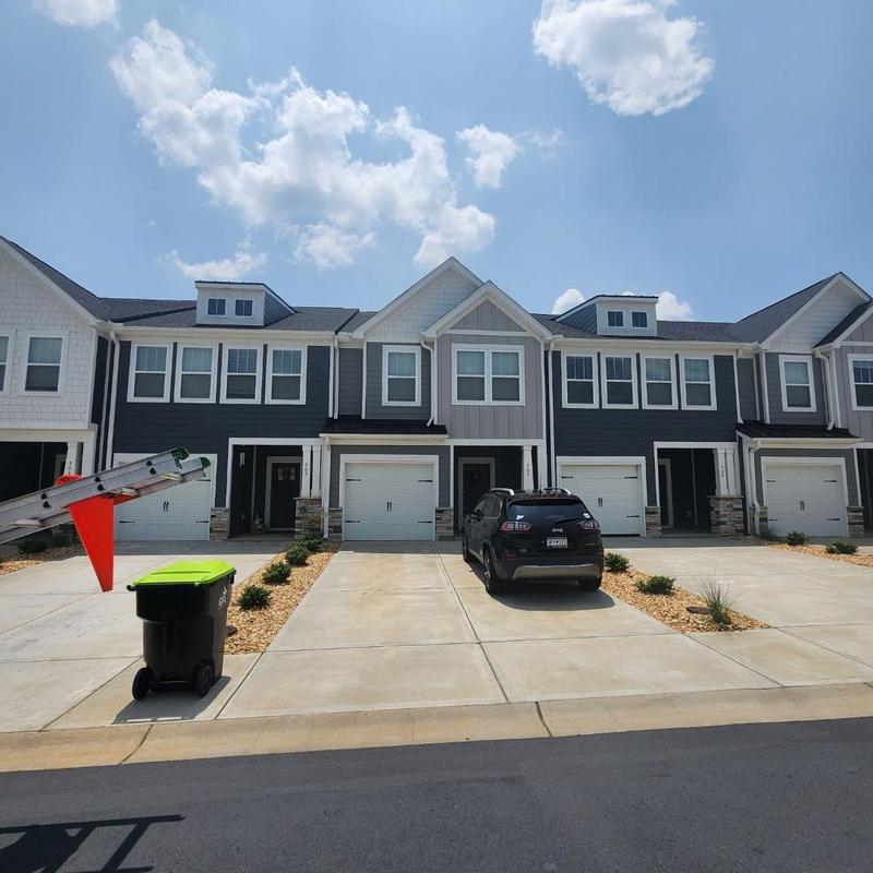 Roof shingles inspection on suburban townhomes