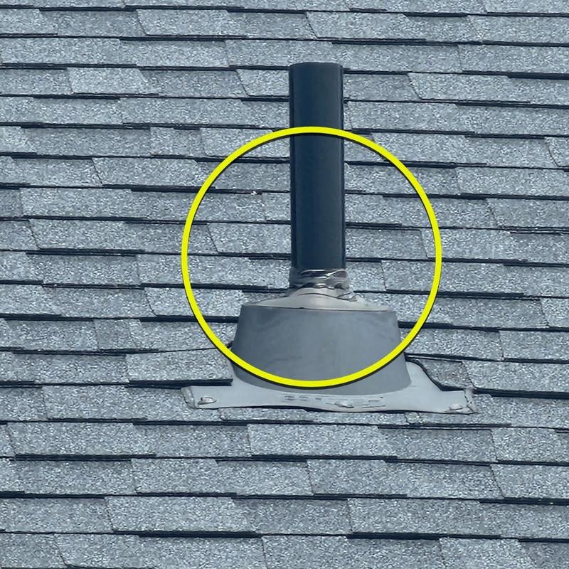 Roof vent pipe flashing on asphalt shingle roof inspection