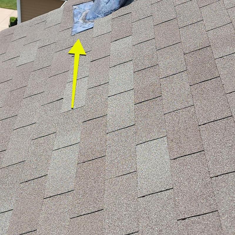 Roof shingles and vent pipe flashing with repair arrow