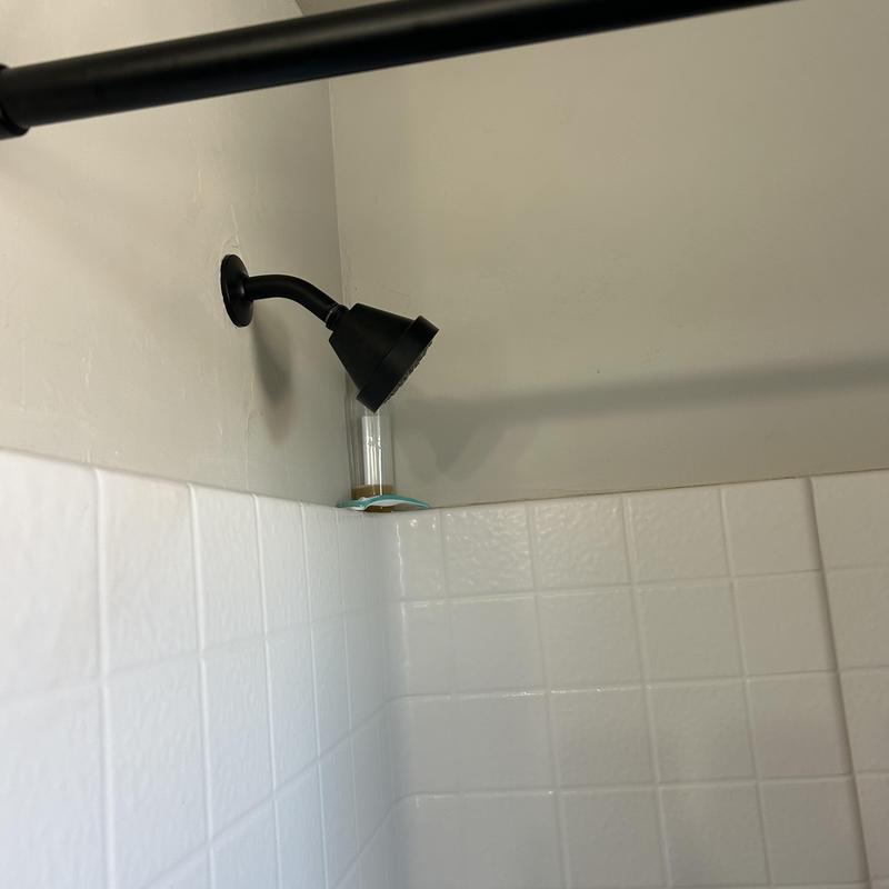 Shower head with restored water pressure in tiled shower Shower head with restored water pressure in tiled shower