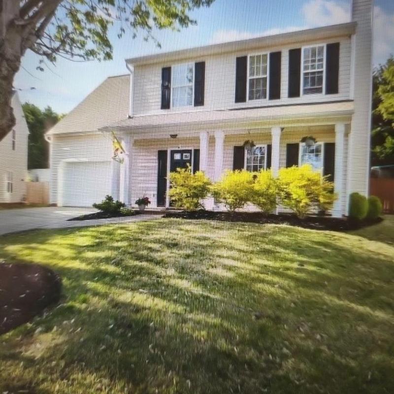 Asphalt shingle roof inspection on two-story house
