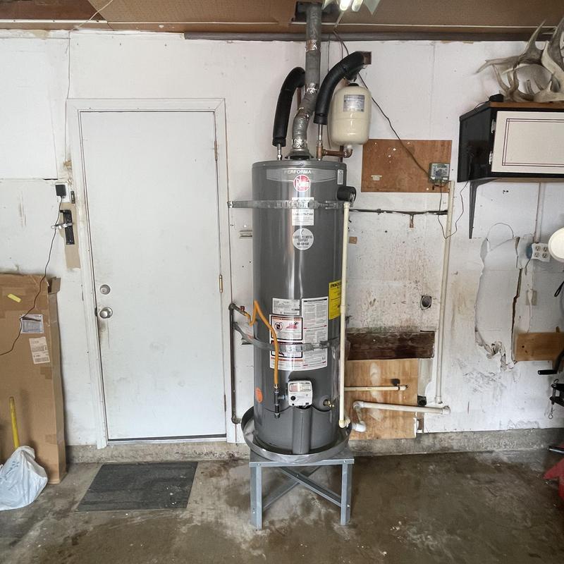 40 gallon water heater with updated piping and venting