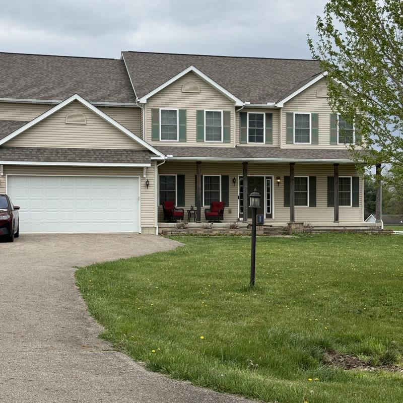Asphalt shingle roof with porch and garage in Ashville Asphalt shingle roof with porch and garage in Ashville