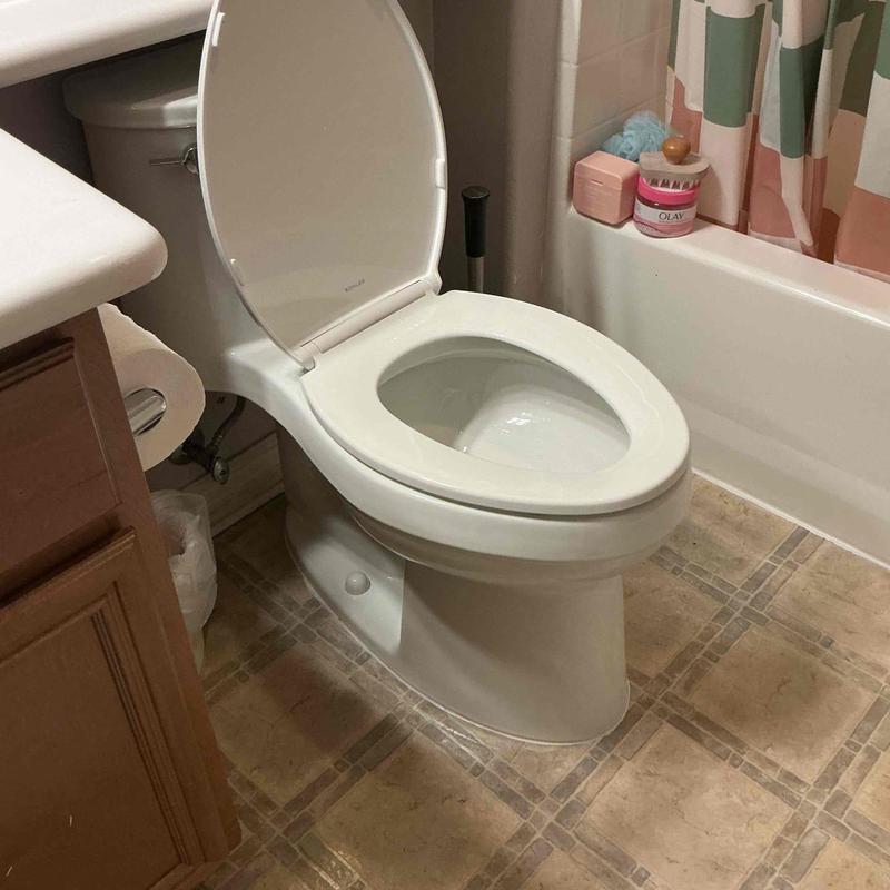 One-piece Kohler toilet installation in bathroom