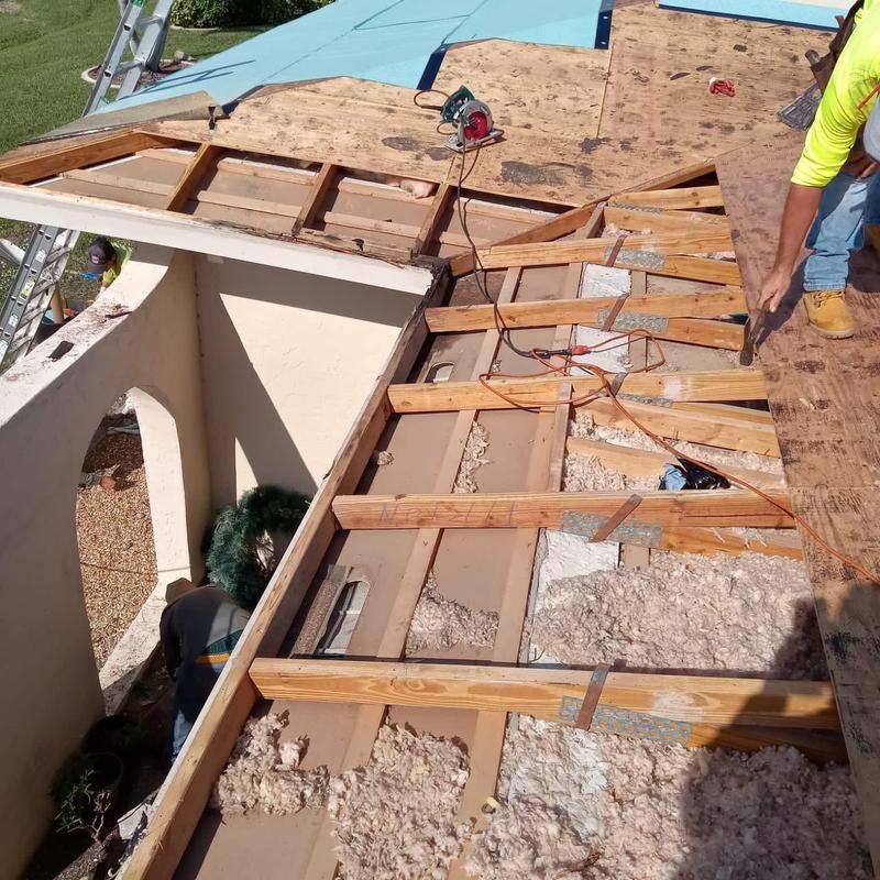 Roof decking replacement with exposed wood framing