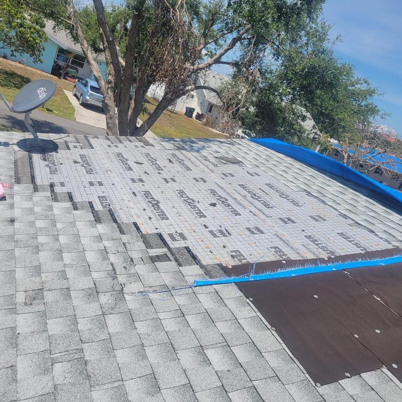 Shingle roof underlayment installation with tarp removal