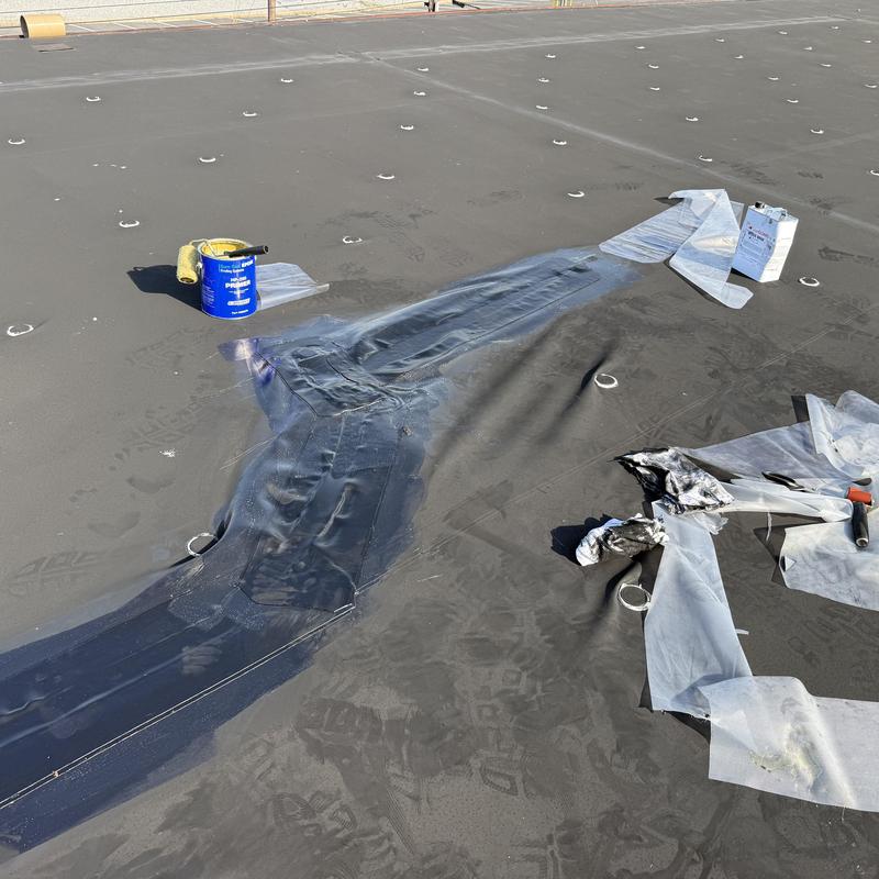 EPDM roof membrane sealed with GACO Patch and flashing