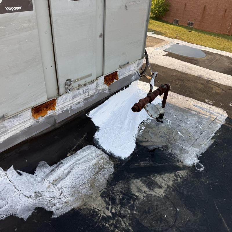 EPDM roof leak patching near AC unit roof base
