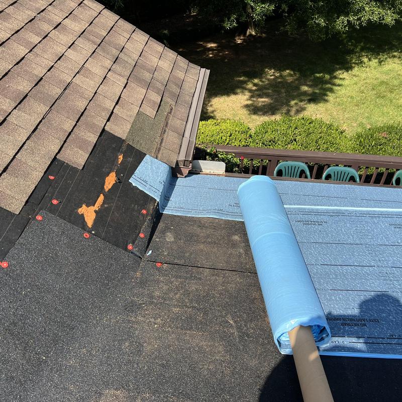 Low-slope roof modified base and cap sheet installation