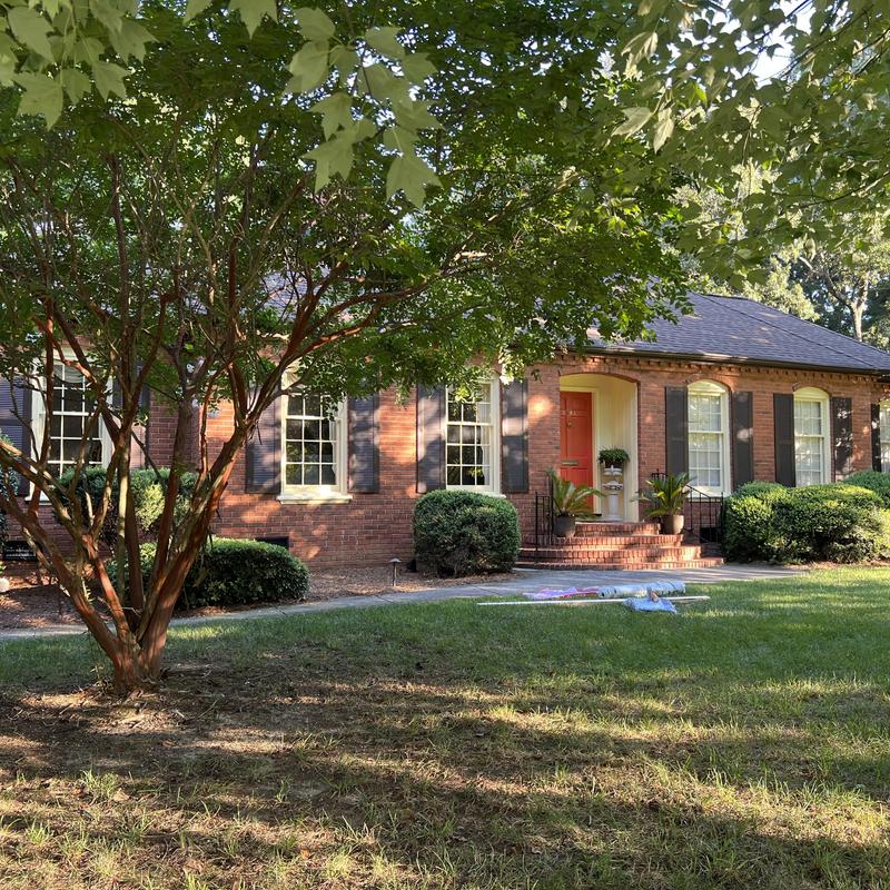 Low-slope modified roof system with pipe and wall flashings