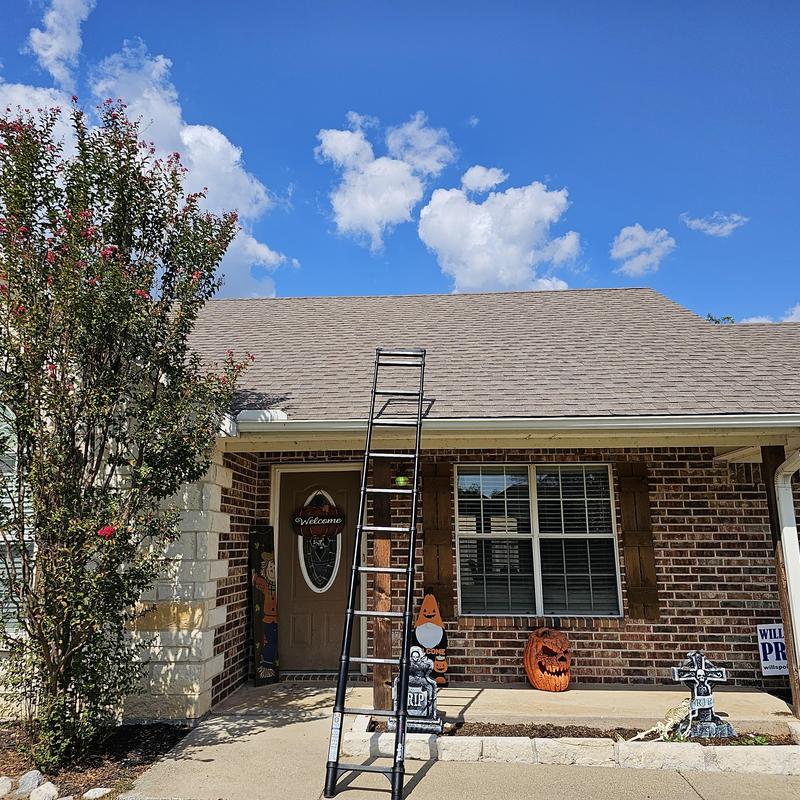 Roof shingles hail damage inspection with ladder