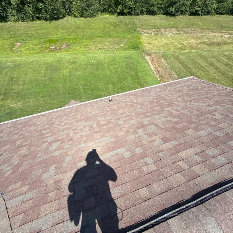 Asphalt shingle roof with minor hail damage inspection