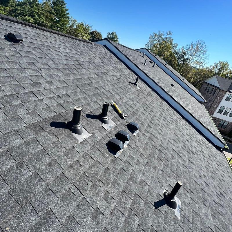Asphalt roof shingles with vent pipe flashing installation