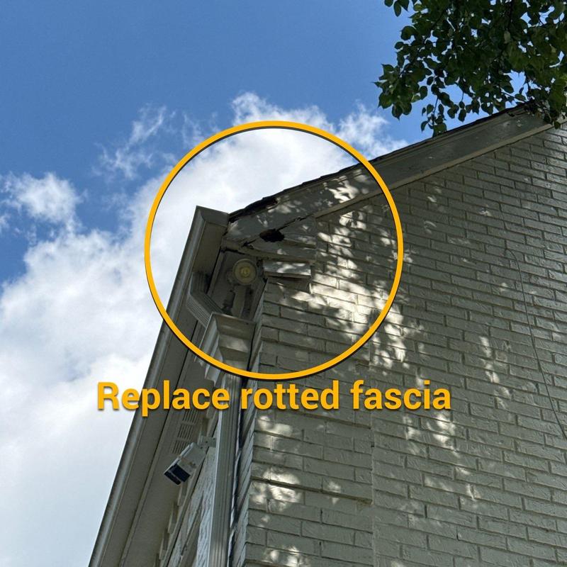 Fascia board rotted section on brick house exterior