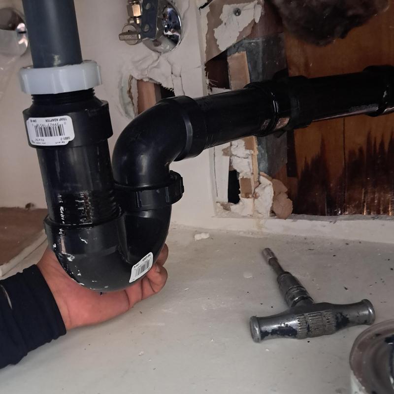 Upstairs sink drain pipe with new fittings installation