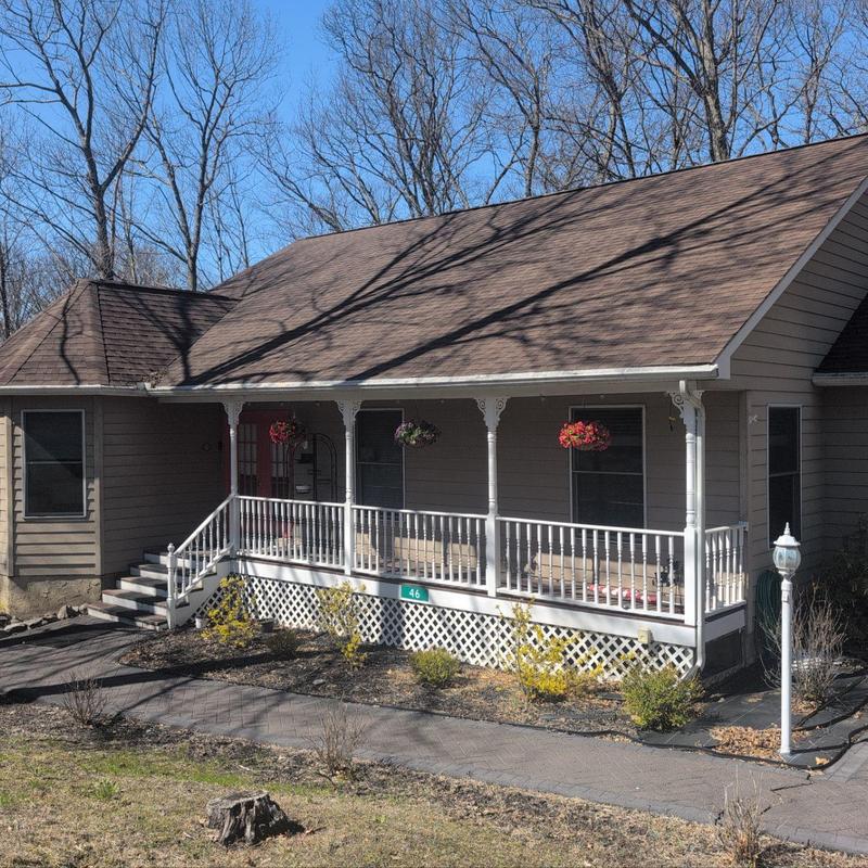 Asphalt shingle roof inspection on residential house Asphalt shingle roof inspection on residential house