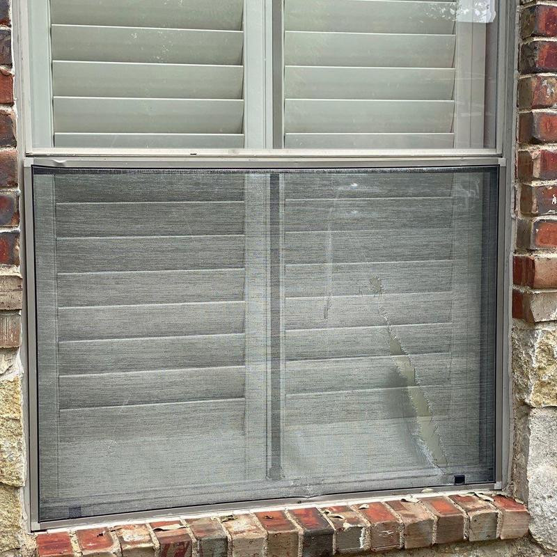 Window screen with tear and damaged mesh repair needed Window screen with tear and damaged mesh repair needed