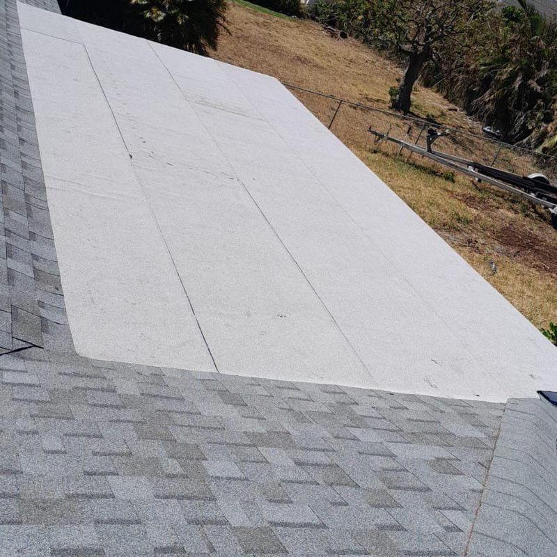 Polyglass peel-and-stick underlayment on asphalt shingle roof