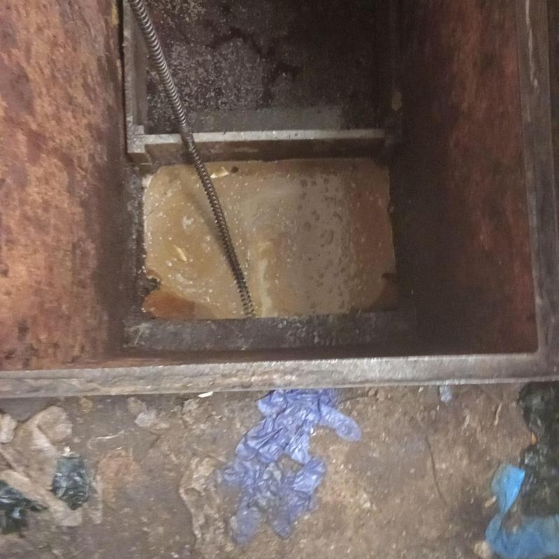 Main sewer line inspection with snake tool in drain pit
