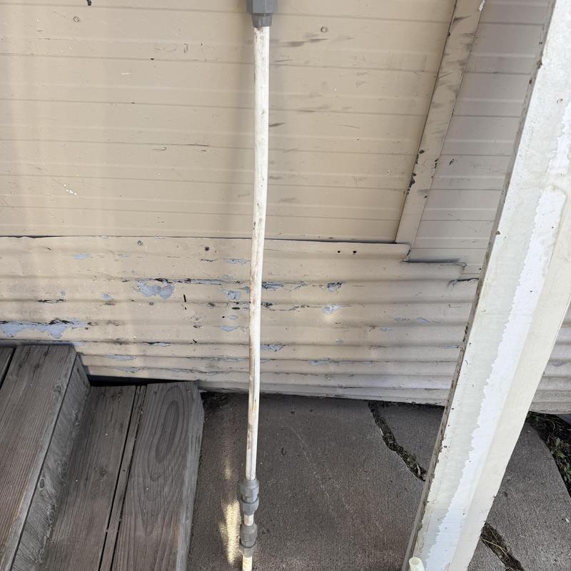 Three-quarter inch waterline with fittings outside house Three-quarter inch waterline with fittings outside house